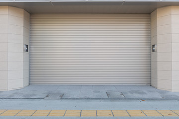 sidewalk by street wall & door