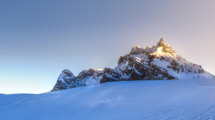 Mountain and ridge of Dolomiti covered with snow