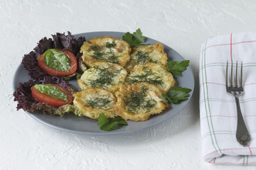 Roasted (fried) slices zucchini in egg batter
