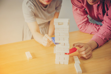 business people playing wooden tower game, Planning concept, risk concept, strategy concept, soft...