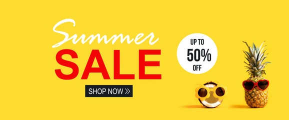 Summer Sale with pineapple and coconut wearing sunglasses