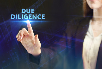 The concept of business, technology, the Internet and the network. A young entrepreneur working on a virtual screen of the future and sees the inscription: Due diligence