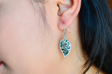 beautiful colorful earring on girl ear,silver  jewelry.