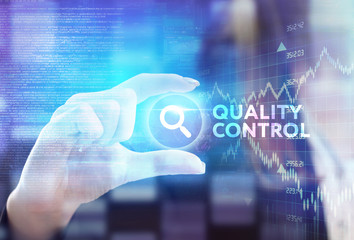 The concept of business, technology, the Internet and the network. A young entrepreneur working on a virtual screen of the future and sees the inscription: Quality control