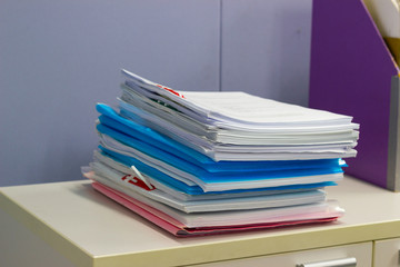 file folder and Stack of business report paper file on the table in a work office, concept document...