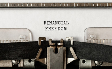 Text Financial Freedom typed on retro typewriter