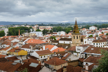 Aerial view of Tomar, Portugal with the prominent churchtower of the 15th-century Church of Saint John the Baptist