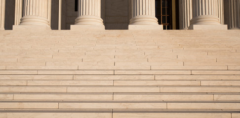 Close up photo of the column bases and steps of the US Supreme Court in Washington, D.C. - obrazy, fototapety, plakaty