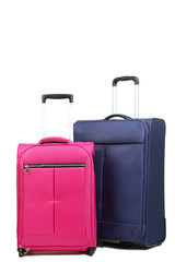 Blue and pink suitcases isolated on white background