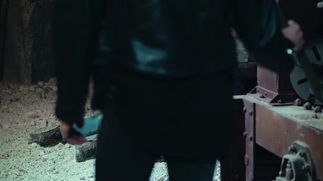 young crazy psychopath tries to hit a man holding a prisoner