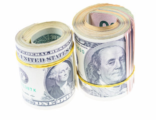 A pack of American dollars rolled up on a roll isolated on a white background.
