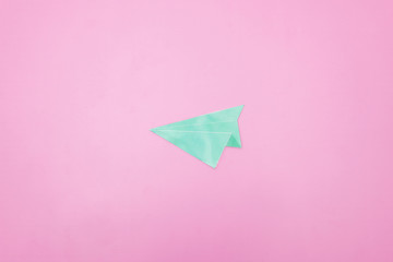 illustration photo of a paper plane on pink background
