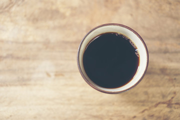 Coffee cup in coffee shop - vintage style effect picture