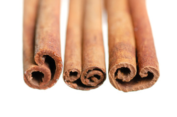 Cinnamon sticks close-up macro on white background isolation