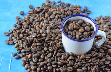 Coffee beans on a blue background 