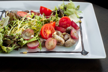 Chicken hearts, vegetable salad.