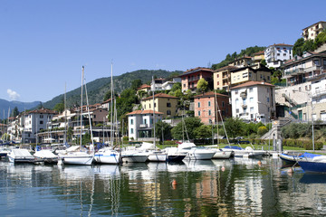 Fototapeta na wymiar .Lake with boats on the water. Beautiful landscape in Italy with boats on the water.