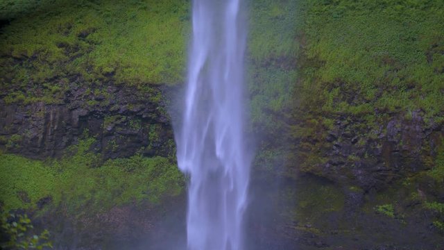 Slow-motion footage of water cascading down the middle of the South Falls at Silver Falls in Oregon.  Shot on a Blackmagic Ursa Mini Pro 4.6k with a Sigma 50-100mm f/1.8.