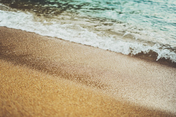 coastline beach on sunny day background of ocean and sky, gold sand blur, tourism relax calm concept, seascape perspective vacation, summer seashore on blue sea waves and sand, mockup