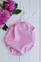 pink baby bodysuit. clothes for the baby. children's clothes