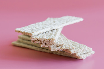 the loaves and the tape diet slim health on a pink background
