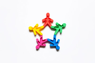 Friendship of peoples is a symbol of colored men on a white background.