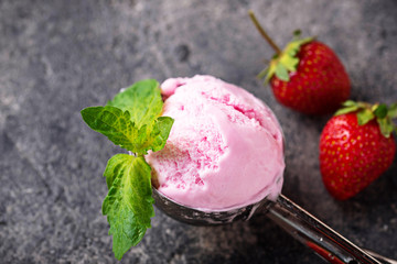 Ball of strawberry Ice cream in scoop