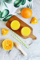 Fresh Orange Juice in the Glass Summer Morning Drink Beverage Gray Background Vitamins