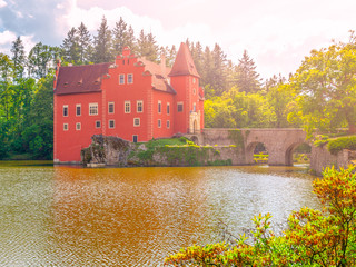 Naklejka na ściany i meble Renaissance chateau Cervena Lhota in Southern Bohemia, Czech Republic. Idyllic and picturesque fairy tale castle on the small island reflected in the romantic lake.