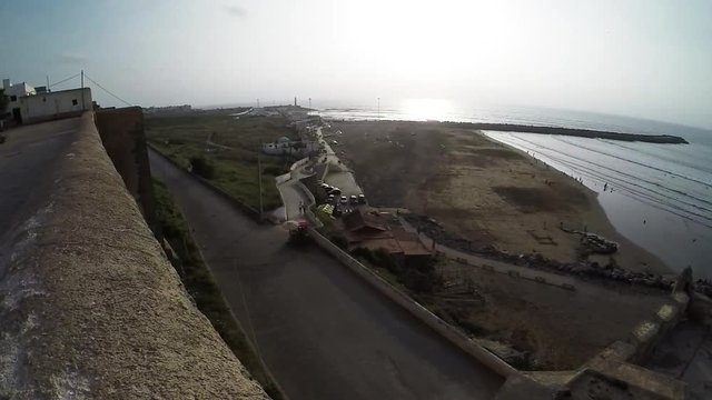 Pan left, ancient sea port in Morocco