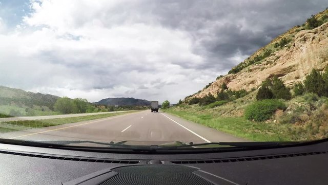 POV scenic landscape drive behind truck