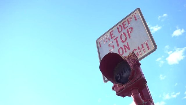 pan right, fire department stop sign