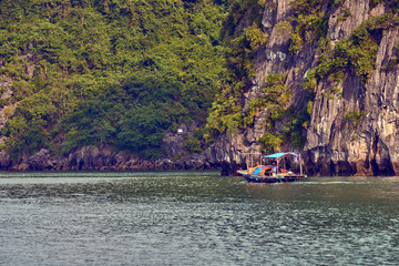 Halong bay boats,Sunset at Ha Long Bay scenic view , Hanoi, Vietnam , Southeast Asia