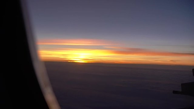 POV, scenic sunset from  plane window