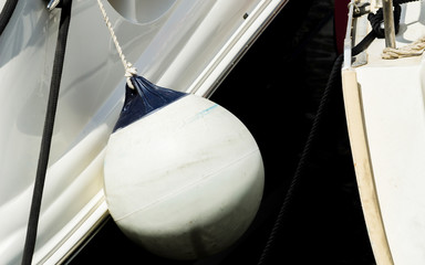 buoy hanging outside the hull of the boat, boat equipment
