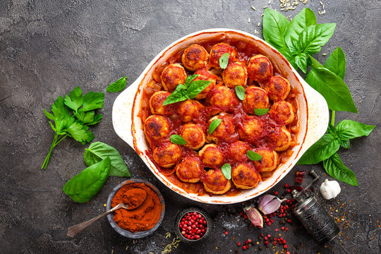 Meatballs. Meatballs in tomato sauce with carrot and onion