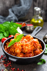 Meatballs. Meatballs in tomato sauce with carrot and onion