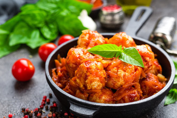 Meatballs. Meatballs in tomato sauce with carrot and onion