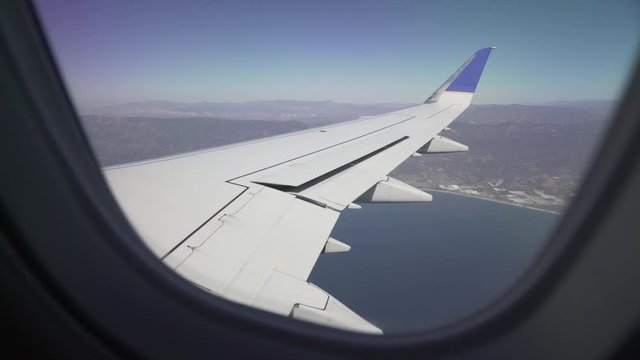 pov, view of wing from plane window