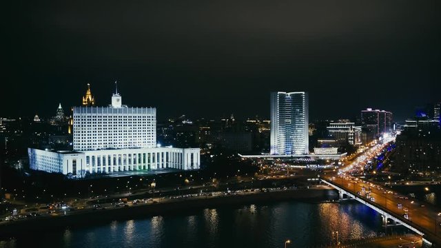 The House of the Government of the Russian Federation. Cars and skyscrapers. Night Moscow. Locked down real time medium shot