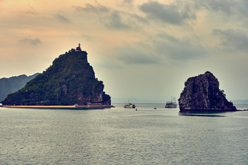 Halong bay boats, Vietnam Panoramic view of sunset in Halong Bay, Vietnam, Southeast Asia,UNESCO World Heritage Site, Poor lighting conditions