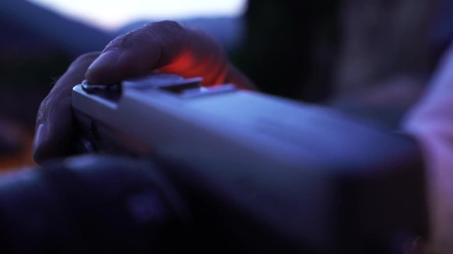 person takes photo, close up