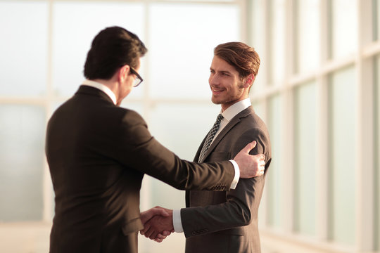friendly handshake of business partners