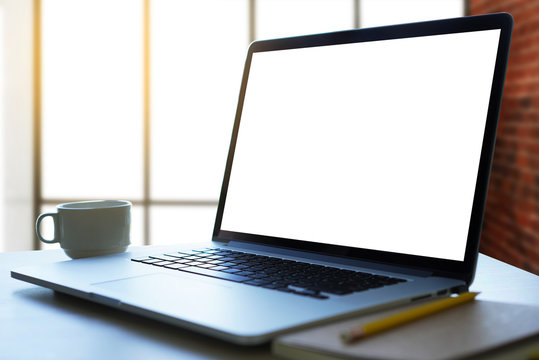 Laptop with blank screen on table. Workspace background new project on laptop computer with blank copy space screen for your advertising text message