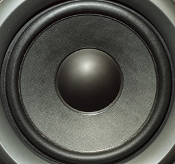Detail shot of some old round speakers.