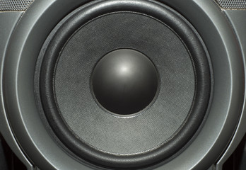 Detail shot of some old round speakers.