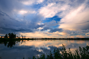 The oil pumping units  and cloudscape sunset.