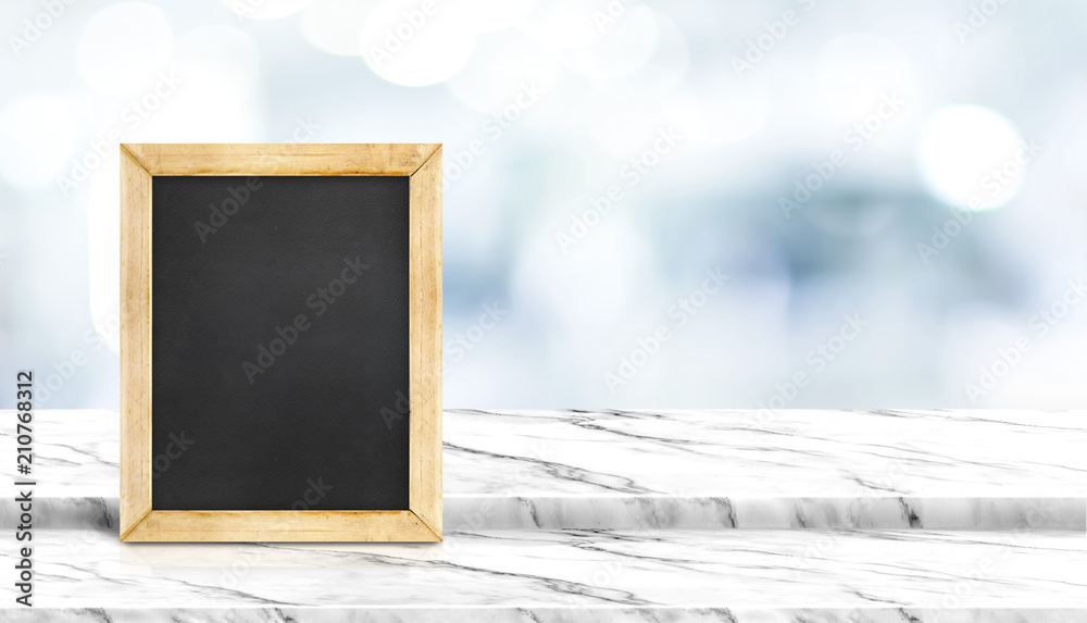 Poster blackboard on step white marble table top with blur patient waiting for doctor at hospital with boke