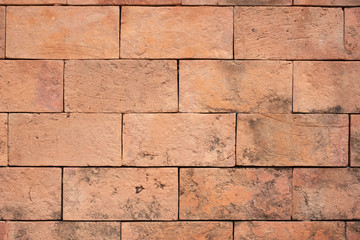 Grunge orange brick wall texture background,outdoor wall.