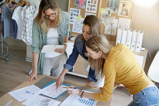 Fashion designers working together on project